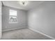 Simple bedroom with gray walls and carpeted floors at 8946 W Teton Cir, Littleton, CO 80128