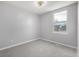 Bright bedroom featuring a window and ceiling fan at 8946 W Teton Cir, Littleton, CO 80128