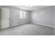 Spacious bedroom with gray walls and carpeted floors at 8946 W Teton Cir, Littleton, CO 80128