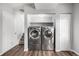 Laundry room with stackable washer and dryer at 8946 W Teton Cir, Littleton, CO 80128