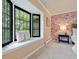 Brightly lit bay window seat in the main bedroom at 5751 E Ithaca Pl # 3, Denver, CO 80237