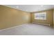 A room with natural light and carpet flooring at 5751 E Ithaca Pl # 3, Denver, CO 80237