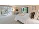 A view from the bedroom with a bay window and the sunroom at 5751 E Ithaca Pl # 3, Denver, CO 80237