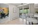 Kitchen nook featuring a bar area that opens onto a lovely screened-in patio area at 5751 E Ithaca Pl # 3, Denver, CO 80237