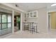 Cozy kitchen nook includes a bar area and adjacent access to the relaxing screened in patio at 5751 E Ithaca Pl # 3, Denver, CO 80237