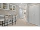 Bright kitchen with modern appliances, breakfast bar, and ample storage space at 5751 E Ithaca Pl # 3, Denver, CO 80237