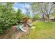 Backyard playground with slides, climbing structure, and play equipment, perfect for outdoor activities at 7034 S Cherry St, Centennial, CO 80122