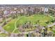 Aerial view of a large park with winding walkways and mature trees at 1085 N Lafayette St # 702, Denver, CO 80218