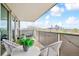 Serene balcony featuring cozy seating and a stunning city view, perfect for enjoying outdoor relaxation and entertainment at 1085 N Lafayette St # 702, Denver, CO 80218