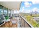Charming balcony with comfortable seating and picturesque city views, ideal for outdoor dining and relaxation at 1085 N Lafayette St # 702, Denver, CO 80218