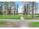 Scenic view of City Park with walking path, trees, and open green space on a sunny day at 1085 N Lafayette St # 702, Denver, CO 80218