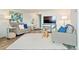 Bright living room featuring modern decor, comfortable seating, and stylish accents, perfect for relaxing and entertaining at 1085 N Lafayette St # 702, Denver, CO 80218