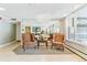 Comfortable lobby with armchairs, table, mirror and view to mailboxes at 1085 N Lafayette St # 702, Denver, CO 80218
