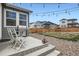 Backyard with patio, outdoor lights, landscaping and grill at 3492 N Buchanan Way, Aurora, CO 80019