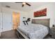 Spacious bedroom showing bed, an art piece, and doorway access to other rooms at 3492 N Buchanan Way, Aurora, CO 80019