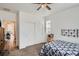 Bedroom with a closet and a bed and a view to the living room at 3492 N Buchanan Way, Aurora, CO 80019