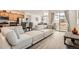 Spacious living area with an open floor plan to the kitchen and dining area at 3492 N Buchanan Way, Aurora, CO 80019