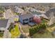 Aerial view of the home's backyard with deck and landscaping, offering a private outdoor space at 684 Poppy Pl, Highlands Ranch, CO 80129