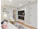 Cozy finished basement area with a modern electric fireplace and stylish decor at 684 Poppy Pl, Highlands Ranch, CO 80129