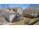 Lovely backyard with a wooden deck and a well-maintained lawn, great for relaxing at 10885 Longs Peak Ln, Parker, CO 80138