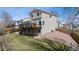 Spacious backyard with a large deck and patio, perfect for outdoor entertaining at 10885 Longs Peak Ln, Parker, CO 80138