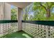 Charming balcony with a view of lush trees and clear blue sky at 7770 W 38Th Ave # 207, Wheat Ridge, CO 80033