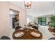 Cozy dining area adjacent to the living room and kitchen, perfect for casual meals at 7770 W 38Th Ave # 207, Wheat Ridge, CO 80033