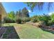 This property features a private, well-maintained backyard with mature trees and lawn at 3375 Zephyr Ct, Wheat Ridge, CO 80033