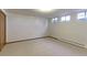Basement bedroom features carpet flooring, small window, and closet at 3375 Zephyr Ct, Wheat Ridge, CO 80033