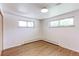 Simple bedroom with hardwood floors, and a neutral color palette at 3375 Zephyr Ct, Wheat Ridge, CO 80033