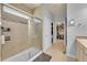 The primary bathroom has a walk-in shower, tile surround, and access to a walk-in closet at 675 W 171St Pl, Broomfield, CO 80023