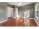 Inviting bedroom with hardwood floors, natural light, and neutral paint at 4577 Elm Ct, Denver, CO 80211