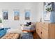 Bright main bedroom sitting area with hardwood floors, natural light, and neutral colors at 4577 Elm Ct, Denver, CO 80211