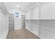 Spacious walk-in closet with ample shelving and storage space at 4577 Elm Ct, Denver, CO 80211