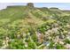 Aerial shot with mountain views shows a charming community with lush trees and a serene atmosphere at 503 15Th St, Golden, CO 80401