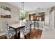 Elegant dining area featuring a marble-topped table, stylish chairs, and hardwood floors at 503 15Th St, Golden, CO 80401