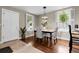 Cozy dining room with dark wood floors, bright windows, and stylish decor at 503 15Th St, Golden, CO 80401