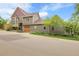 Beautiful exterior of home with lush landscaping, a well-kept lawn, and a two-car garage at 503 15Th St, Golden, CO 80401