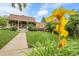 Charming curb appeal with mature trees, well-maintained lawn, and inviting front porch enhance this home at 503 15Th St, Golden, CO 80401