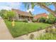Charming home featuring a well-maintained lawn, lush greenery, and a quaint front porch at 503 15Th St, Golden, CO 80401