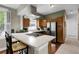 Modern kitchen with quartz countertops, stainless steel appliances, and a breakfast bar at 503 15Th St, Golden, CO 80401