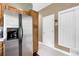 Kitchen area showcasing stainless steel refrigerator and pantry storage at 503 15Th St, Golden, CO 80401