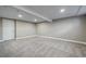 Finished basement offering a large open space and neutral carpeting at 8308 W 90Th Ave, Westminster, CO 80021