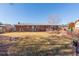 Large backyard with shed and brick home at 888 Oak St, Lakewood, CO 80215