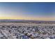 Beautiful aerial view showing a community with mountain views in the distance at 12988 E 108Th Pl, Commerce City, CO 80022