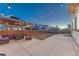 Backyard showcasing a patio, a pergola, and string lights for evening enjoyment at 12988 E 108Th Pl, Commerce City, CO 80022