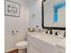 Charming half bathroom featuring a farmhouse sink and decorative accents at 12988 E 108Th Pl, Commerce City, CO 80022