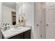 Clean bathroom with a modern sink, decorative towels, and ample counter space at 12988 E 108Th Pl, Commerce City, CO 80022
