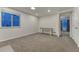 Inviting bedroom with neutral carpet, a large window, and a bright atmosphere at 12988 E 108Th Pl, Commerce City, CO 80022