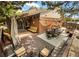 Back deck with outdoor furniture and string lights at 4180 S Yukon Way, Lakewood, CO 80235